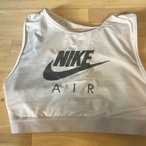 High neck, white Nike sports bra